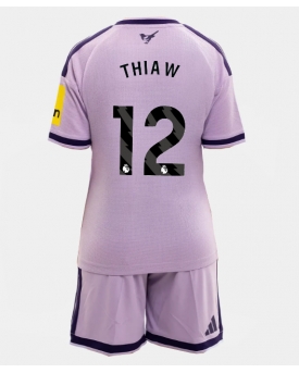 Newcastle United Malick Thiaw #12 Maglia Gara Terza Repliche 2026-27 Bambino Maniche Corte Newcastle United Malick Thiaw #12 Maglia Gara Terza Repliche 2026-27 Bambino Maniche Corte